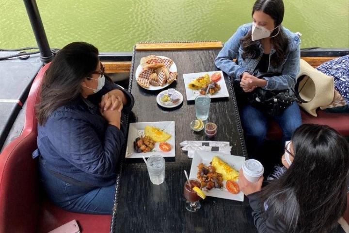 a group of people sitting at a table