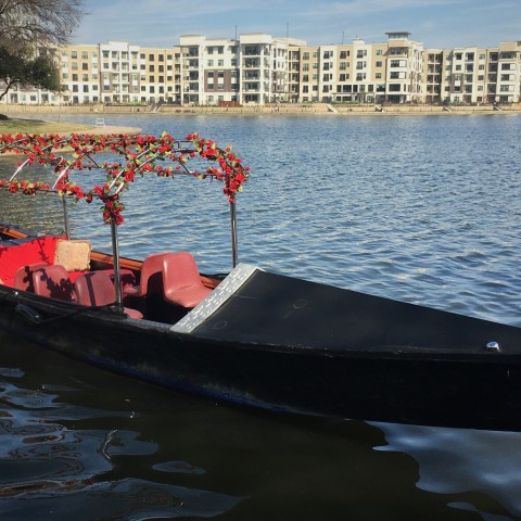 a small boat in a large body of water