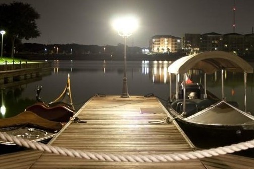 a boat sitting on top of a wooden table