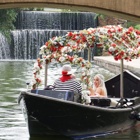 a group of people on a boat in the water