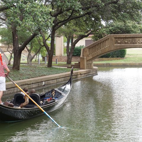 a small boat in a body of water
