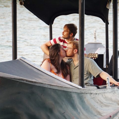 a small boat in a body of water