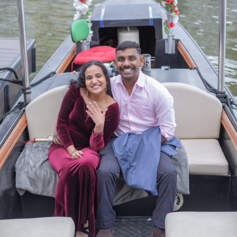 a man and a woman sitting on a bench