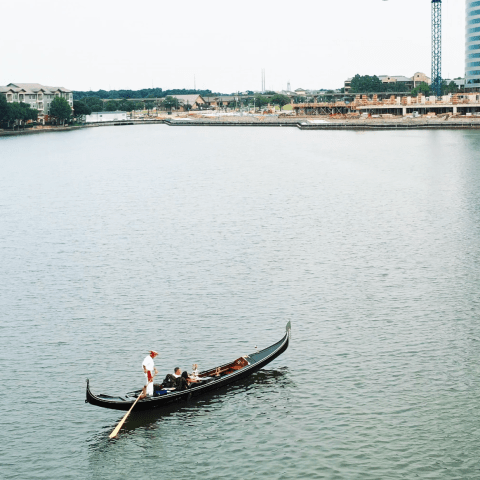 a small boat in a large body of water