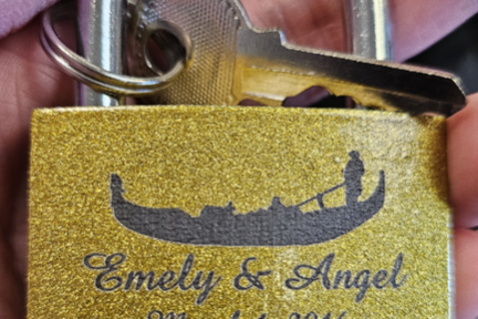 a hand holding up a sign